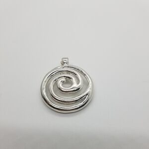 large silver tone metal swirl enhancer pendant